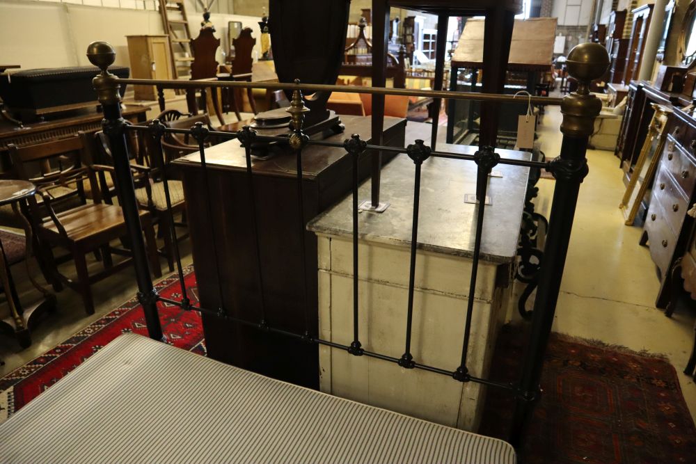 A Victorian style metal and brass double bed frame, width 140cm